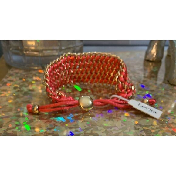 Lovita rhinestone encrusted salmon color bracelet expands 12in retracts 6in - Picture 2 of 6